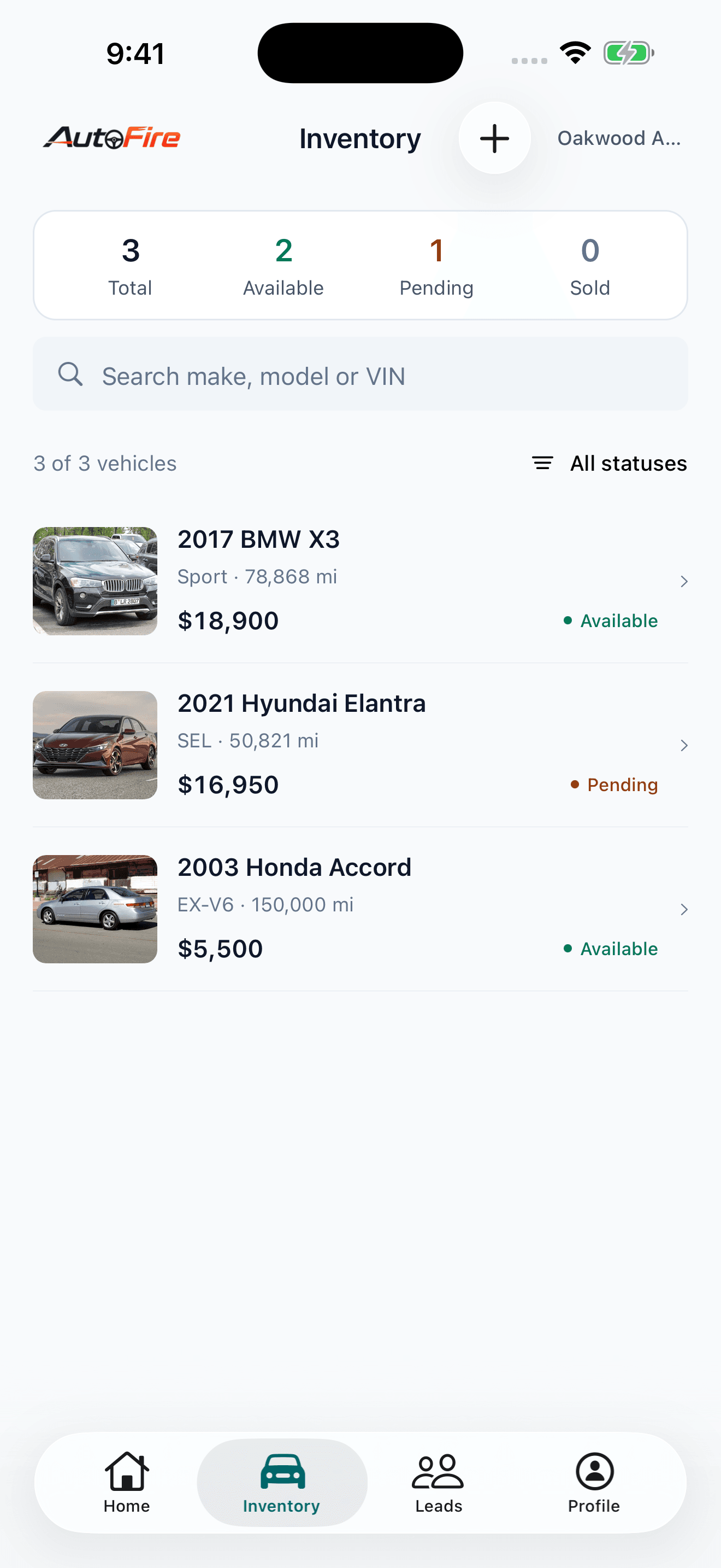 AutoFire Dealer running on iPhone, showing inventory with vehicle photos, prices, and availability.